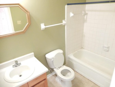 LOVELY Occupied SE Duplex w/ Carports, Fenced Yards, & Storage on Hilaman Park Golf Course in Florida - for sale on GolfHomes.com, golf home, golf lot