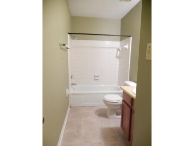 LOVELY Occupied SE Duplex w/ Carports, Fenced Yards, & Storage on Hilaman Park Golf Course in Florida - for sale on GolfHomes.com, golf home, golf lot