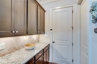 Nestled in the heart of The Georgia Club, 2189 Bessbrook Square on The Georgia Club in Georgia - for sale on GolfHomes.com, golf home, golf lot