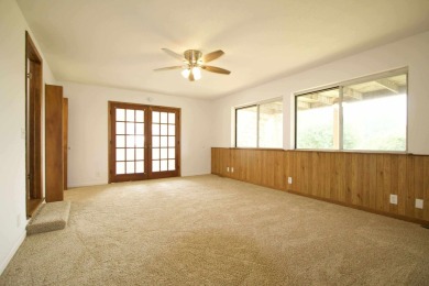 This peaceful Harrisville home, nestled along the fairways of on Greenbush Golf Course in Michigan - for sale on GolfHomes.com, golf home, golf lot