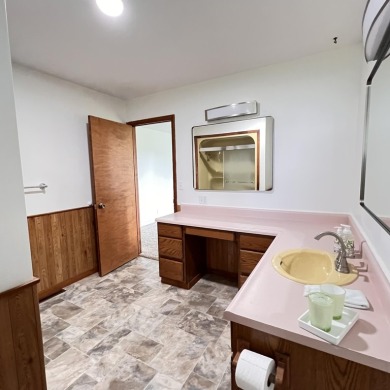 This peaceful Harrisville home, nestled along the fairways of on Greenbush Golf Course in Michigan - for sale on GolfHomes.com, golf home, golf lot