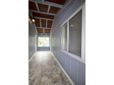 This peaceful Harrisville home, nestled along the fairways of on Greenbush Golf Course in Michigan - for sale on GolfHomes.com, golf home, golf lot