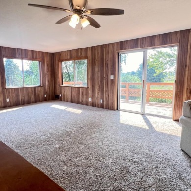 This peaceful Harrisville home, nestled along the fairways of on Greenbush Golf Course in Michigan - for sale on GolfHomes.com, golf home, golf lot