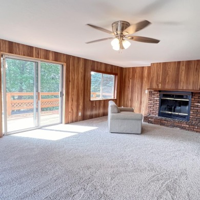 This peaceful Harrisville home, nestled along the fairways of on Greenbush Golf Course in Michigan - for sale on GolfHomes.com, golf home, golf lot