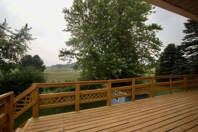 This peaceful Harrisville home, nestled along the fairways of on Greenbush Golf Course in Michigan - for sale on GolfHomes.com, golf home, golf lot