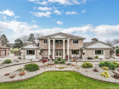 Welcome to 17867 Yorkshire Drive, an architectural masterpiece on Riverview Highlands Golf Club  in Michigan - for sale on GolfHomes.com, golf home, golf lot