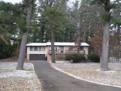 Country living conveniently located a short distance from the on Hiawatha Golf Club in Wisconsin - for sale on GolfHomes.com, golf home, golf lot