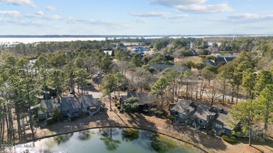 Captivating water views from almost every room in this 2-bedroom on Harbour Point Golf Club in North Carolina - for sale on GolfHomes.com, golf home, golf lot