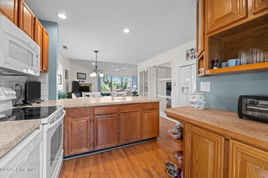 Captivating water views from almost every room in this 2-bedroom on Harbour Point Golf Club in North Carolina - for sale on GolfHomes.com, golf home, golf lot