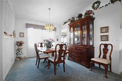 This spacious home is on a private conservation lot. It has an on Monarch At Royal Highlands in Florida - for sale on GolfHomes.com, golf home, golf lot