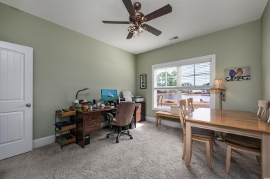 Welcome to this elegant 4-bedroom (plus 1 non-conforming) lake on Wild Wing Plantation in South Carolina - for sale on GolfHomes.com, golf home, golf lot