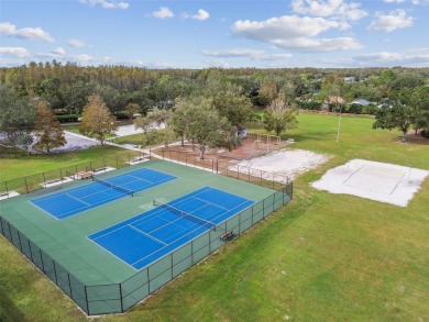 This charming 3-bedroom, 2-bath, 2-car garage home, located in on Heritage Harbor Golf and Country Club in Florida - for sale on GolfHomes.com, golf home, golf lot