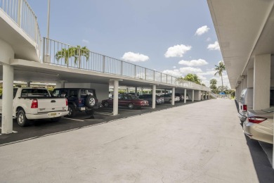 SUNNY, PLEASANT and BRIGHT 2/2 corner east side unit at The on North Palm Beach Country Club in Florida - for sale on GolfHomes.com, golf home, golf lot