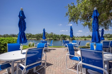 SUNNY, PLEASANT and BRIGHT 2/2 corner east side unit at The on North Palm Beach Country Club in Florida - for sale on GolfHomes.com, golf home, golf lot
