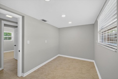 One or more photo(s) has been virtually staged. One or more on Gulf Harbors Golf Course in Florida - for sale on GolfHomes.com, golf home, golf lot