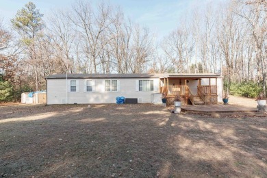 Welcome to this charming manufactured home, situated on over an on Sand Valley Golf Course in Wisconsin - for sale on GolfHomes.com, golf home, golf lot