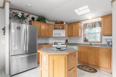 Welcome to this charming manufactured home, situated on over an on Sand Valley Golf Course in Wisconsin - for sale on GolfHomes.com, golf home, golf lot