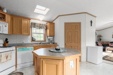 Welcome to this charming manufactured home, situated on over an on Sand Valley Golf Course in Wisconsin - for sale on GolfHomes.com, golf home, golf lot