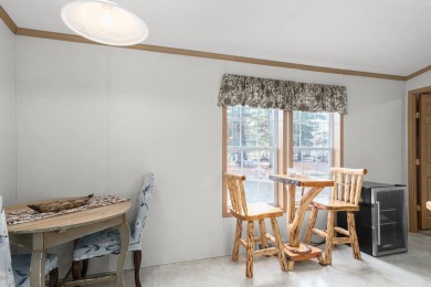 Welcome to this charming manufactured home, situated on over an on Sand Valley Golf Course in Wisconsin - for sale on GolfHomes.com, golf home, golf lot