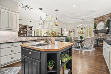 This stunning custom home overlooks the 8th fairway and green of on Reynolds Lake Oconee - The Oconee in Georgia - for sale on GolfHomes.com, golf home, golf lot