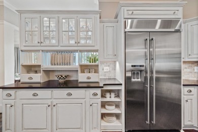 This stunning custom home overlooks the 8th fairway and green of on Reynolds Lake Oconee - The Oconee in Georgia - for sale on GolfHomes.com, golf home, golf lot