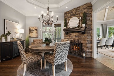 This stunning custom home overlooks the 8th fairway and green of on Reynolds Lake Oconee - The Oconee in Georgia - for sale on GolfHomes.com, golf home, golf lot