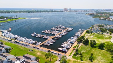 Step into this stunning condo, perfectly situated on the golf on Bay Point Resort Golf Club in Florida - for sale on GolfHomes.com, golf home, golf lot
