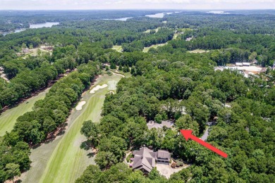 This stunning custom home overlooks the 8th fairway and green of on Reynolds Lake Oconee - The Oconee in Georgia - for sale on GolfHomes.com, golf home, golf lot