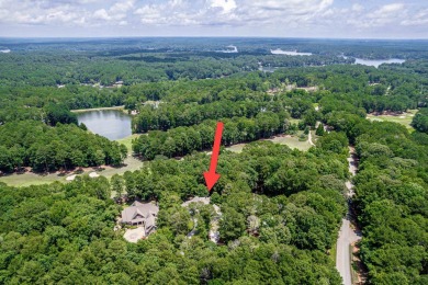 This stunning custom home overlooks the 8th fairway and green of on Reynolds Lake Oconee - The Oconee in Georgia - for sale on GolfHomes.com, golf home, golf lot