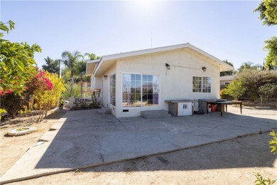 This wonderful home is nestled amidst gently rolling hills in a on Hansen Dam Golf Course in California - for sale on GolfHomes.com, golf home, golf lot