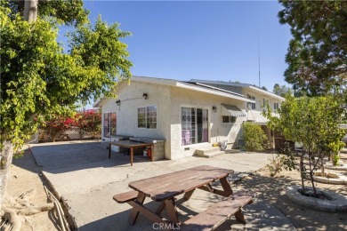 This wonderful home is nestled amidst gently rolling hills in a on Hansen Dam Golf Course in California - for sale on GolfHomes.com, golf home, golf lot