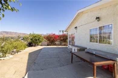 This wonderful home is nestled amidst gently rolling hills in a on Hansen Dam Golf Course in California - for sale on GolfHomes.com, golf home, golf lot