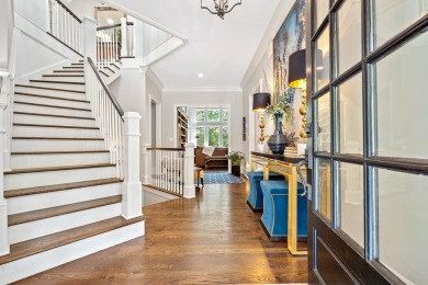 This stunning custom home overlooks the 8th fairway and green of on Reynolds Lake Oconee - The Oconee in Georgia - for sale on GolfHomes.com, golf home, golf lot