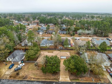 Discover the charm of this recently renovated 3-bed, 2-bath home on Mississippi National Golf Course in Mississippi - for sale on GolfHomes.com, golf home, golf lot