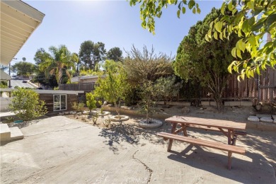 This wonderful home is nestled amidst gently rolling hills in a on Hansen Dam Golf Course in California - for sale on GolfHomes.com, golf home, golf lot