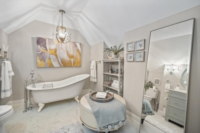 This stunning custom home overlooks the 8th fairway and green of on Reynolds Lake Oconee - The Oconee in Georgia - for sale on GolfHomes.com, golf home, golf lot