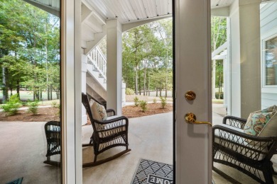 This stunning custom home overlooks the 8th fairway and green of on Reynolds Lake Oconee - The Oconee in Georgia - for sale on GolfHomes.com, golf home, golf lot