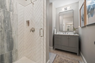 This stunning custom home overlooks the 8th fairway and green of on Reynolds Lake Oconee - The Oconee in Georgia - for sale on GolfHomes.com, golf home, golf lot