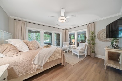 This stunning custom home overlooks the 8th fairway and green of on Reynolds Lake Oconee - The Oconee in Georgia - for sale on GolfHomes.com, golf home, golf lot