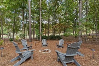 This stunning custom home overlooks the 8th fairway and green of on Reynolds Lake Oconee - The Oconee in Georgia - for sale on GolfHomes.com, golf home, golf lot