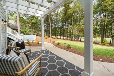 This stunning custom home overlooks the 8th fairway and green of on Reynolds Lake Oconee - The Oconee in Georgia - for sale on GolfHomes.com, golf home, golf lot