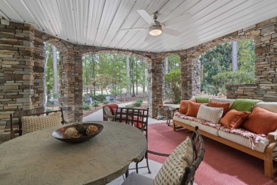 This stunning custom home overlooks the 8th fairway and green of on Reynolds Lake Oconee - The Oconee in Georgia - for sale on GolfHomes.com, golf home, golf lot