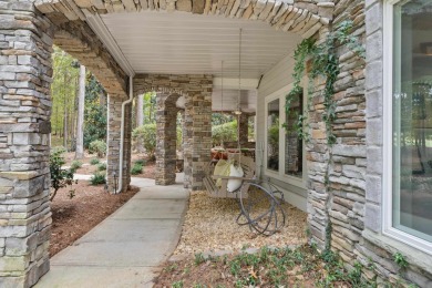 This stunning custom home overlooks the 8th fairway and green of on Reynolds Lake Oconee - The Oconee in Georgia - for sale on GolfHomes.com, golf home, golf lot