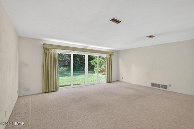 Incredible value in the highly desirable Tomoka Oaks on Tomoka Oaks Golf and Country Club in Florida - for sale on GolfHomes.com, golf home, golf lot