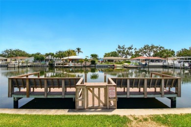 A Rare Opportunity in Mariners Pass - Waterfront Living with on Mangrove Bay Golf Course in Florida - for sale on GolfHomes.com, golf home, golf lot