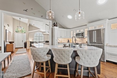 OPEN HOUSE SATURDAY MAY 31 FROM 10-1 STUNNING WATER-VIEW HOME on Eagle Harbor Golf Club in Florida - for sale on GolfHomes.com, golf home, golf lot