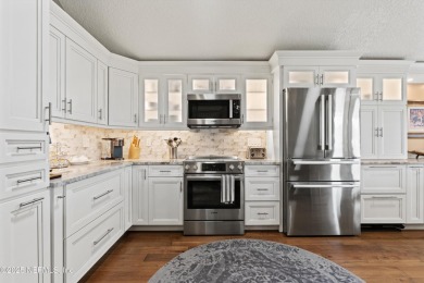 OPEN HOUSE SATURDAY MAY 31 FROM 10-1 STUNNING WATER-VIEW HOME on Eagle Harbor Golf Club in Florida - for sale on GolfHomes.com, golf home, golf lot