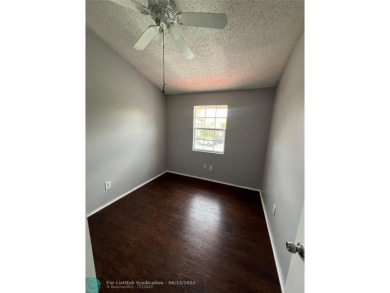 Spacious 3-Bedroom Townhome with Golf Course Views - West on Woodmont Country Club in Florida - for sale on GolfHomes.com, golf home, golf lot