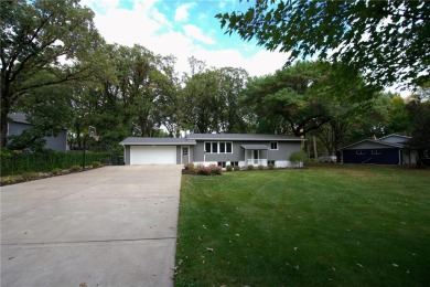 Beautiful 4BR/3BA home in Sartell situated on a wooded 0.53 acre on Pine Ridge Golf Course in Minnesota - for sale on GolfHomes.com, golf home, golf lot