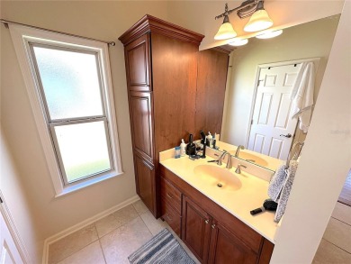 This beautiful Tommy Waters home is ideally located walking on Haile Plantation Golf and Country Club in Florida - for sale on GolfHomes.com, golf home, golf lot